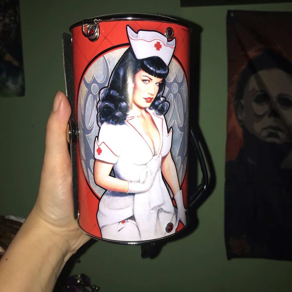 Rare NWOT Betty page vintage style round tin purse
